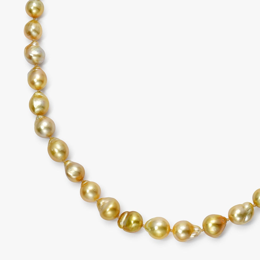 Gold pearl necklace on a white background