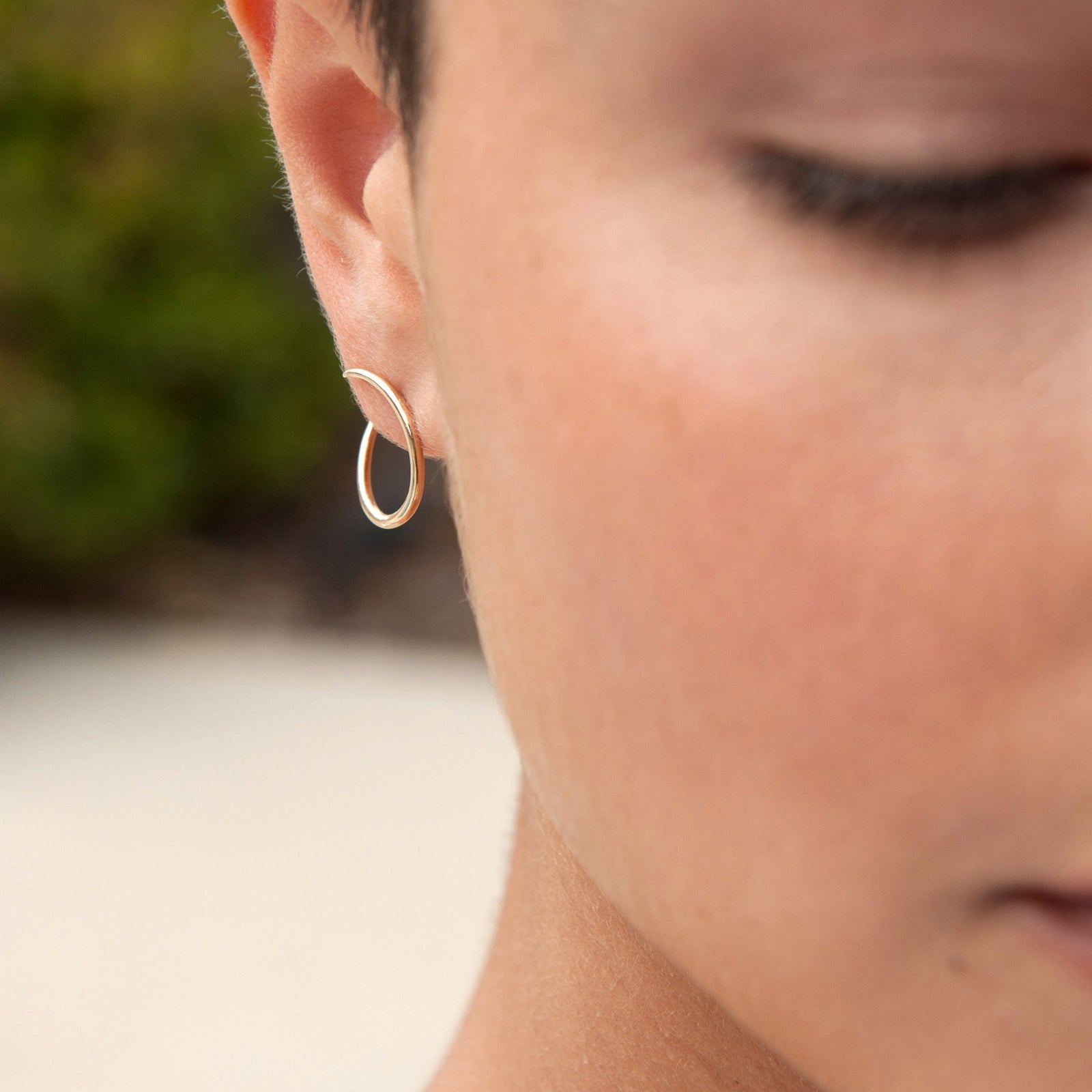 Picture of Esme Loop Gold Hoop Earrings on body  White Space Jewelry